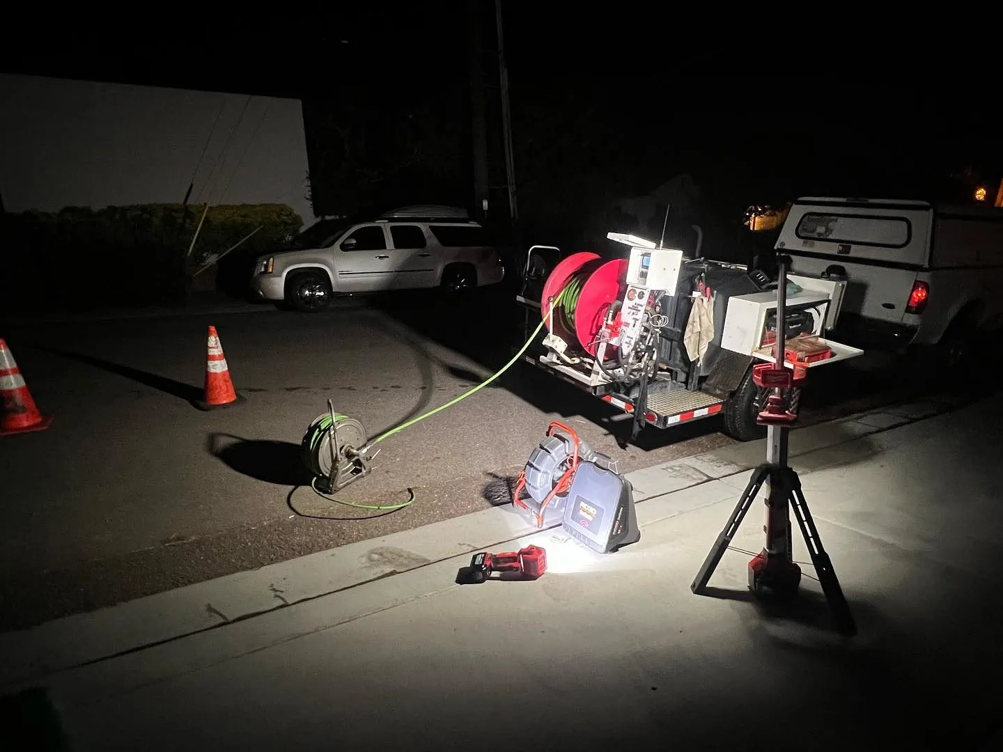 Nicks Drain Service performing a night-time sewer camera inspection in San Diego County